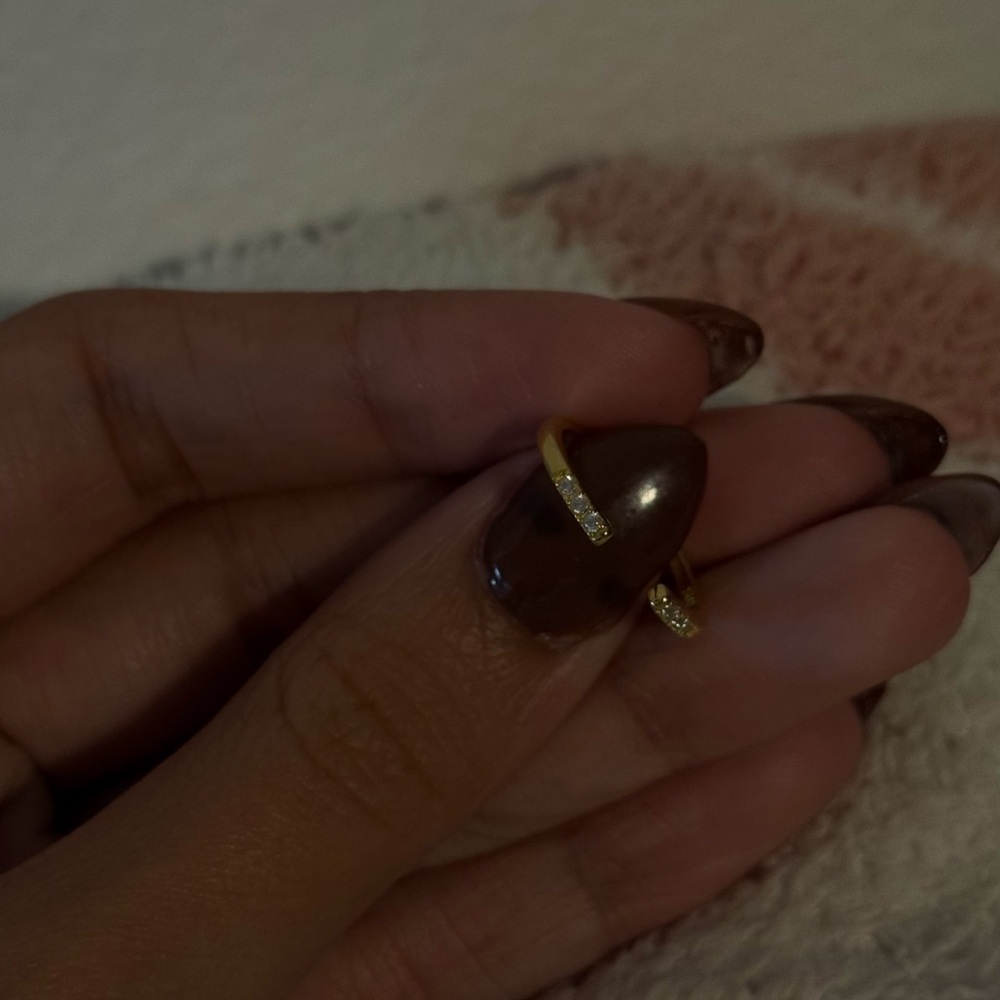 Elegant Gold Ring with Diamond Accents